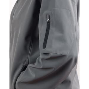 A grey softshell jacket featuring a zippered pocket on the sleeve and a sleek design.