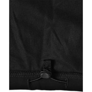 A black softshell vest featuring a drawstring adjustment at the bottom and a logo.