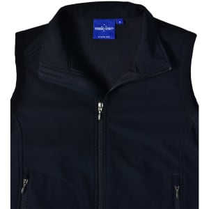A black, softshell vest featuring a zippered front and a collar. It has a branding label inside.