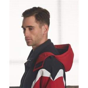 A tri-colour jacket with a hood featuring navy, red, and white sections. It has a logo on the shoulder.