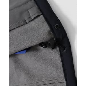 A close-up of the interior lining of a navy men's softshell full zip hoodie, featuring a drawstring and a pocket.