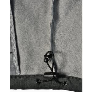 A grey softshell full zip hoodie featuring a drawstring toggle and fleece interior. It has a logo on the fabric.
