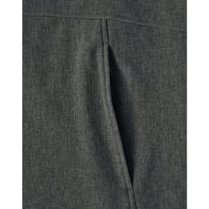 A close-up view of a grey ladies' softshell full zip hoodie showcasing the fabric texture and a zippered pocket.