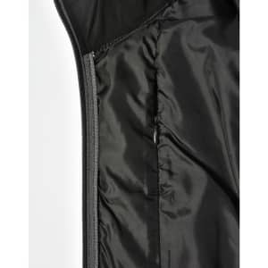A black quilted jacket featuring a heather sleeve and a zippered pocket on the interior.