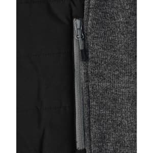 A grey heather fabric with a quilted black interior and a zippered pocket detail. The jacket has a sleek design.