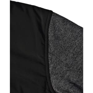 A black quilted jacket featuring a heather grey sleeve. Includes a logo on the fabric.
