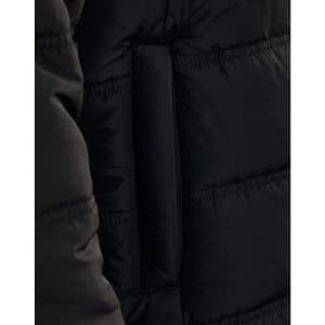 A close-up of a black heavy quilted jacket, highlighting the texture and stitching. The jacket features a brand logo.