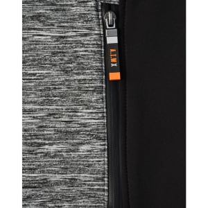 A close-up of a grey and black workwear jacket featuring a zipper and a logo.
