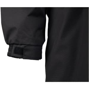 A close-up of the cuff of a black Long Line Stadium Jacket featuring adjustable fastenings.