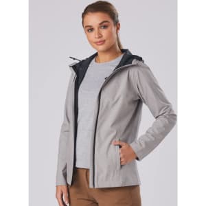 A grey ladies' waterproof performance jacket with a black hood, featuring a logo and zippered pockets.
