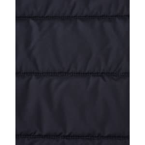 A close-up of a navy blue insulated puffer jacket fabric with a stitched, quilted pattern and a logo.