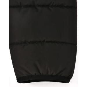 A black puffer jacket featuring a 3D cut with an elasticated hem, designed for insulation and sustainability.