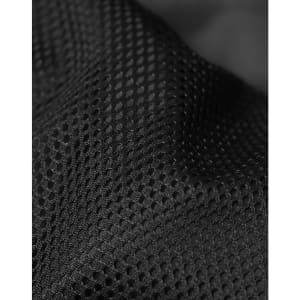 A close-up of black mesh fabric with a textured pattern, showcasing its breathable design and material quality.