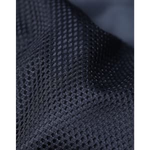 A close-up of a textured black fabric featuring a mesh pattern, ideal for breathable insulation.