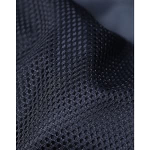 A close-up of textured black mesh fabric featuring a breathable design and a subtle sheen.