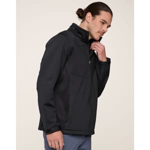 A men's sustainable softshell corporate jacket in black, featuring a zippered front and side pockets.