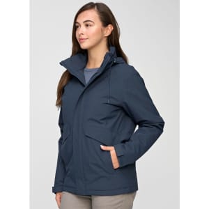 A unisex quilted waterproof jacket in navy, featuring a hood and front pockets, worn by a model.
