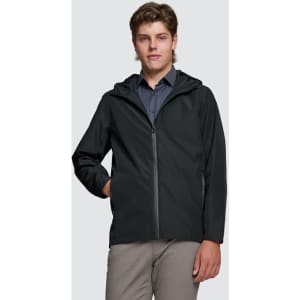 A unisex black waterproof jacket with a hood, worn by a model with light brown hair. Features a logo on the chest.