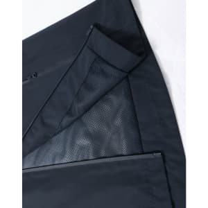 A waterproof jacket in navy, featuring zippered pockets and mesh lining. It includes a logo.