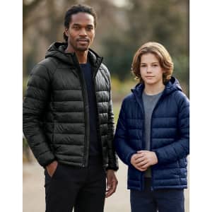 Two models wearing lightweight puffer jackets; one in black and the other in navy blue, both with hoods.