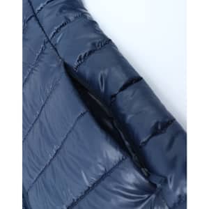 A lightweight, sustainable kids' hooded puffer jacket in navy blue with a zippered opening. Features a logo.