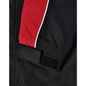 A unisex jacket featuring black fabric with red and white accents and a velcro closure on the sleeve.