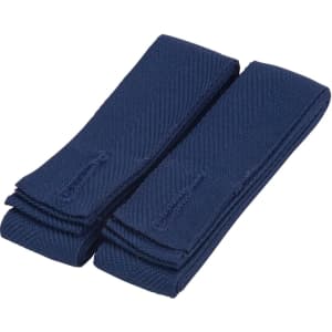 A pair of navy blue changeable apron straps neatly stacked, featuring a textured fabric design.
