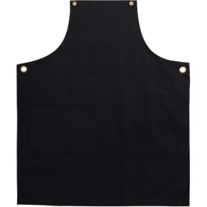 A black canvas bib apron featuring a front pocket and brass eyelets. It has a simple, sleek design.