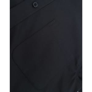 A black cotton blend long-sleeve shirt featuring a chest pocket and button detail. It also has a logo.