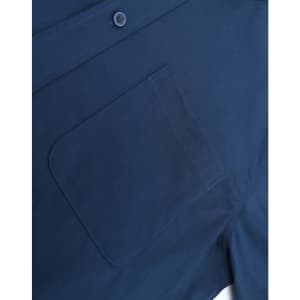 A navy blue men's smart casual cotton blend long-sleeve shirt featuring a chest pocket and a button.