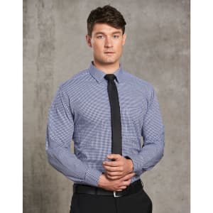 A button-up shirt featuring a two-tone check pattern in navy and white, with long sleeves and a black tie.