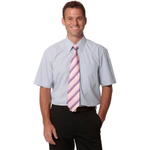 A light blue short-sleeve button-up shirt worn by a man, paired with a pink striped tie and black trousers.