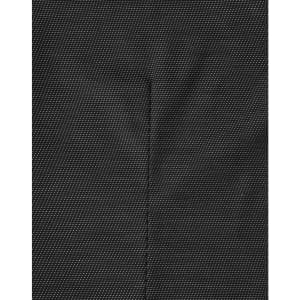 A close-up of a black pin dot patterned fabric, highlighting the texture and detail of the material.