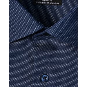 A navy blue men's button-up shirt featuring a pin dot pattern and a logo on the collar.