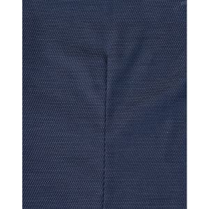 A close-up of a navy blue fabric with a pin dot pattern, showcasing the texture of the shirt.