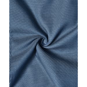 A close-up of a blue fabric with a pin dot pattern, showcasing its stretch and texture.