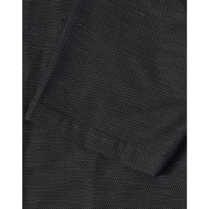 A close-up of a men's black pin dot stretch short-sleeve shirt featuring a pocket and a textured fabric.