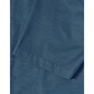 A close-up of a men's short-sleeve button-up shirt in a dark teal colour with a pin dot pattern.