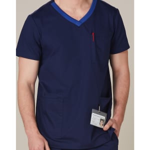 Men's navy scrub top featuring a contrast blue neckline and pocket, with an attached ID badge.