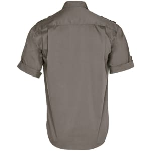 A men's short sleeve military shirt in a plain olive green colour, featuring rolled sleeves and a branding logo.