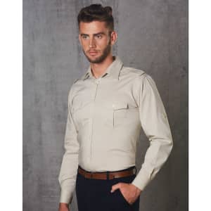 A men's long sleeve military shirt in beige, featuring two front pockets and a logo on the shoulder.