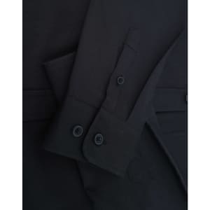 A black ladies' shirt featuring long sleeves and button details, showcasing a cotton blend fabric.