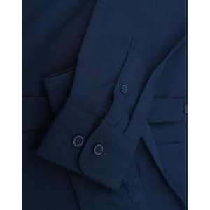 A navy cotton blend long-sleeve shirt with buttoned cuff details and a sleek collar. Features a logo.