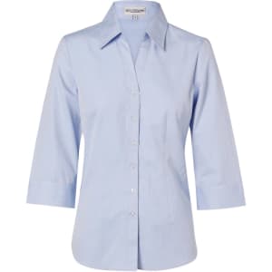 A light blue women's fine chambray shirt with 3/4 sleeves and a button-up front. Features a collar and a logo.