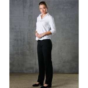 A white women's mini herringbone button-up shirt with 3/4 sleeves, paired with black trousers.