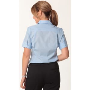 A light blue women's pinstripe short sleeve button-up shirt with a collar and rolled sleeves, featuring a logo.