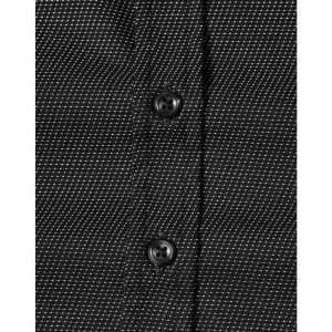 A black and white pin dot button-up shirt featuring a close-up view of buttons.