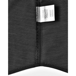 A black fabric swatch with a pin dot pattern, featuring a label with material information and a logo.