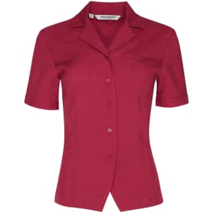 A short-sleeve overblouse in a rich burgundy colour with a collar and a single chest pocket. Features a logo.