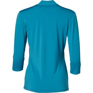 A teal mid sleeve knit top with a relaxed fit and a high neck. Features a logo on the back.